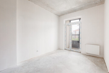 interior of the apartment without decoration in gray colors. rough finish