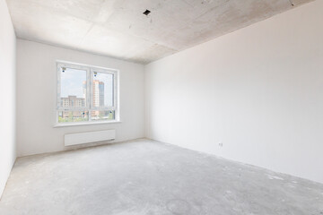 interior of the apartment without decoration in gray colors. rough finish