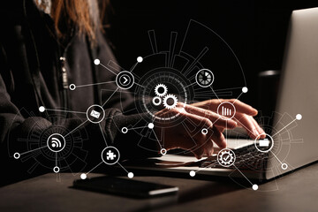 Fototapeta premium Cyber security concept. Illustration of different virtual icons and woman working with laptop at table, closeup