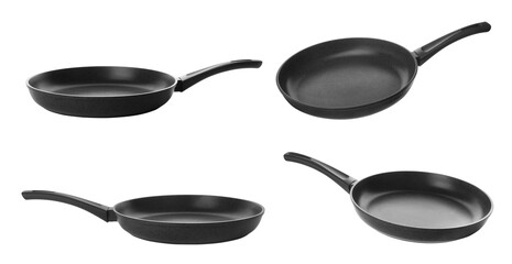 Set with new frying pans on white background