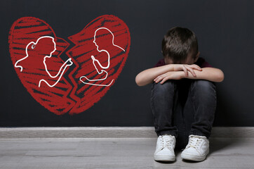 LIttle boy upset because of parents divorce on pink background. Illustration of broken heart and...