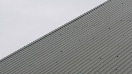 Fototapeta na wymiar metal profile. roofing. replacement of coating for the house. roof repair