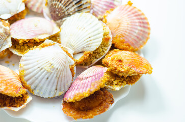 Mini coquilles St. Jacques, Natural scallop shells filled with Patagonian scallops and Thermidor sauce topped with a ciabatta breadcrumb topping