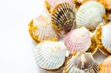 Mini coquilles St. Jacques, Natural scallop shells filled with Patagonian scallops and Thermidor sauce topped with a ciabatta breadcrumb topping