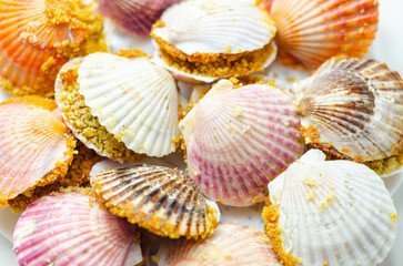 Mini coquilles St. Jacques, Natural scallop shells filled with Patagonian scallops and Thermidor sauce topped with a ciabatta breadcrumb topping