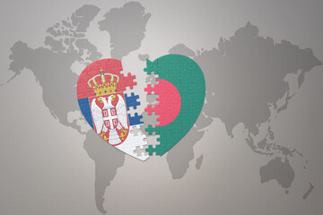 puzzle heart with the national flag of bangladesh and serbia on a world map background.Concept.