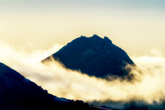 Mountain Peak Through The Fog, Clouds