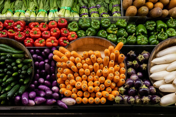 Fresh vegetable place neatly in grocery store. Carrot, Pepper, Eggplant , White Radish, Brocolli,  Bitter guard, cucumber， winter melon and vegatable