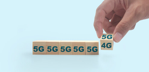 Wooden blocks in hand space and word decide