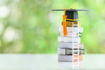 Graduate study abroad program to broaden learner's world view, education concept Graduation cap,...