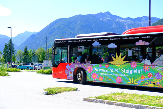 Tyrol public transport buses, roads in valley of mountain villages near Achensee lake in Austria, concept of transportation, tourism, active lifestyle, Achenkirch, Austria - June 2022