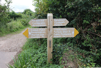 A British coast path sign between Bossington and Porlock Weir. It is also a permitted cycle path