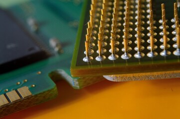microprocessor on the background of the microcircuit of the motherboard