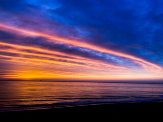 Dramatic Sunset over Calm Seas