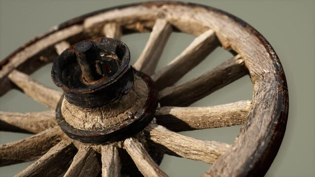 Handmade rustic vintage wooden wheel used in medieval wagons