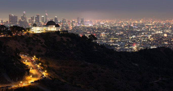 Panorama of Los Angeles and the Griffith Observatory with fireworks on the fourth of July