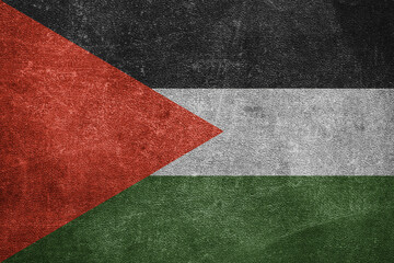 Old leather shabby background in colors of national flag. Palestinian National Authority