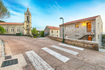 Majestic evening cityscape with Parish Church of the Assumption  in Zonza village