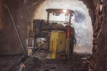 Fototapeta na wymiar Underground equipment. Special load vehicle for mines and tunnels.