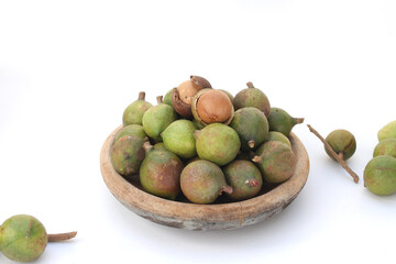 Macadamia nuts on white background
