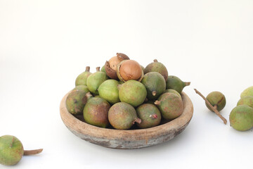 Macadamia nuts on white background