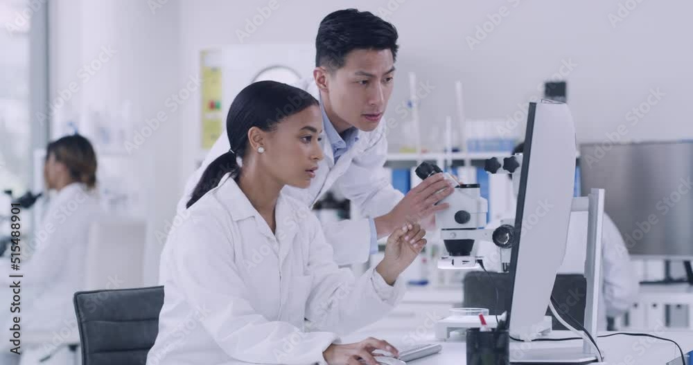 Poster Two scientist using a computer and microscope while conducting medical research in a lab. Innovative biochemists making breakthrough and discovery in a hospital facility while using online technology