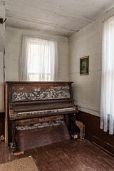 Fototapeta na wymiar Antique Organ / Piano + Jesus Portrait - Abandoned Cleveland Methodist Memorial Church - Appalachian Mountain Region - West Virginia