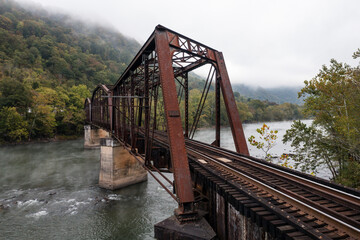 Rusty Antique Parker Through Truss Bridge - Chesapeake & Ohio Railway / CSX - Foggy Morning Along the New River - Prince, West Virginia - 515489957