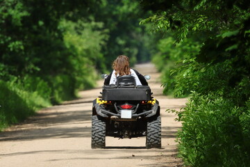 quad on a forest road