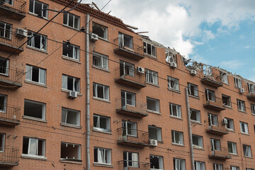 Fototapeta na wymiar War of Russia against Ukraine. A residential building damaged by an russian cruise missiles in the Ukrainian capital Kyiv