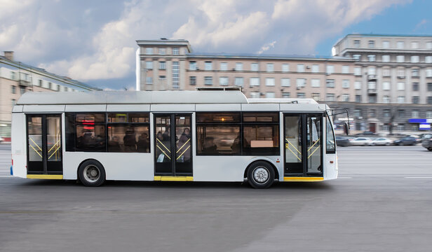 Bus moves along the street in the city.