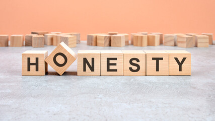 HONESTY word written on wood block. Content text on wooden table for your desing, concept.