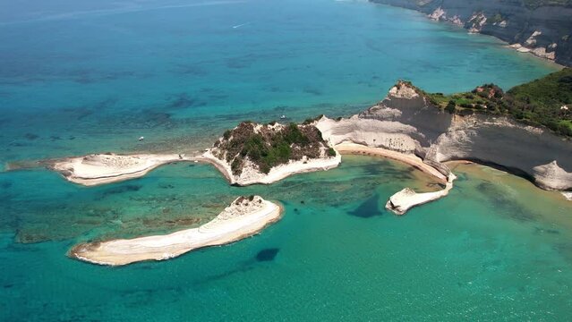 Ionian islands of Greece.  aerial bird eye view of stunning Cape Drastis - natural beauty landscape with white rocks and turquoise waters, northern part of Corfu island.