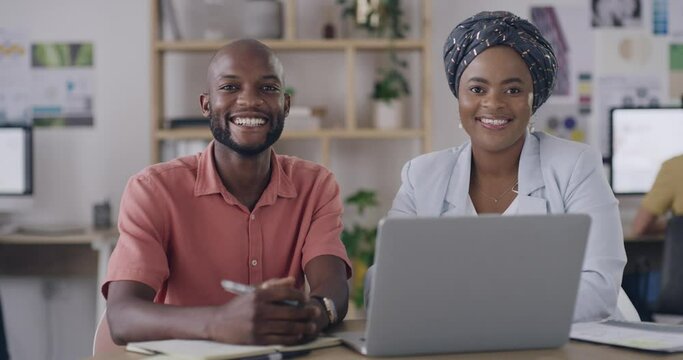 Portrait of two black business people smiling while working in an office. Happy colleagues eager to collaborate as a dedicated team. Confident designers planning for success in a creative startup