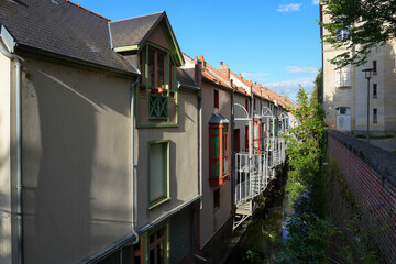 Fototapeta na wymiar Canal on the Somme river in the city center of Amiens in Picardy, France - Houses built on the water