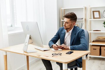 Fototapeta premium businessmen sitting at the computer work boss documentation executive