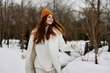 cheerful woman Walk in winter field landscape outdoor entertainment Walk in the winter forest