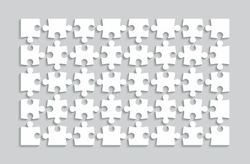 Puzzle pieces. Jigsaw grid wit hseparate shapes. Simple mosaic layout with 40 detached pieces. Thinking game on gray background. Laser cut frame. Vector illustration.