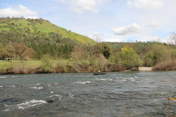 Little boat, Mountains and river, Marshall Gold Discovery State Historic Park, Coloma, California