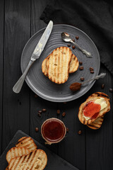 Continental Breakfast meal served with coffee, toast, jam and butter. Delicious coffee table.