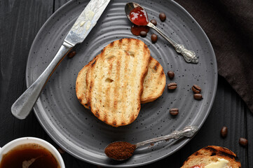 Continental Breakfast meal served with coffee, toast, jam and butter. Delicious coffee table.