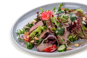 Josper-oven veal salad with sauce. On a white background, isolated.