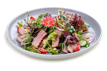 Josper-oven veal salad with sauce. On a white background, isolated.