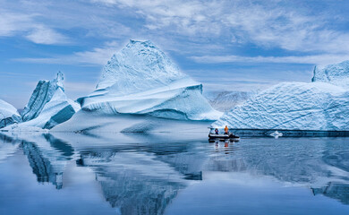 Zodiac travels past a massive Ice Flow in Scoresby Sound Greenland
