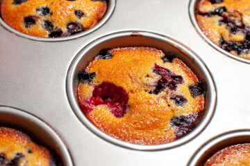 muffins with blueberries and raspberries