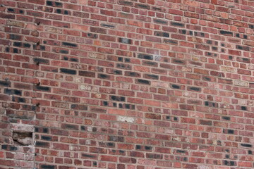 Rough Patchy Brick Wall with Holes