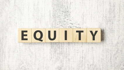 equity word background on wood blocks and white background