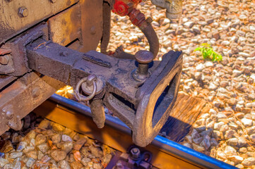 Detail of mechanical parts of older train system.