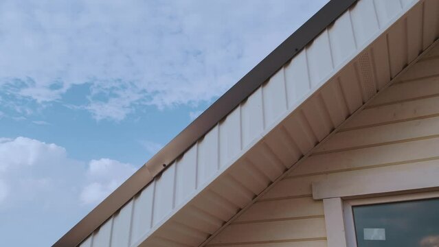 New tiled roof of a frame house