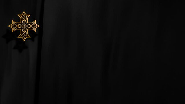 Liturgic black velvet with golden Christian Coptic Orthodox Cross. 3D animation copy space loop background for worship live stream church sermon. Concept of weekday funerals, memorials, and liturgies
